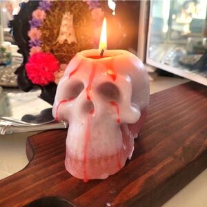 Bleeding white skull candle